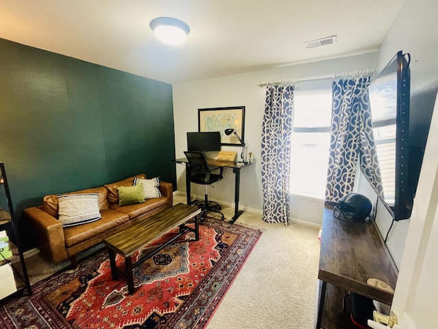 living area featuring carpet flooring