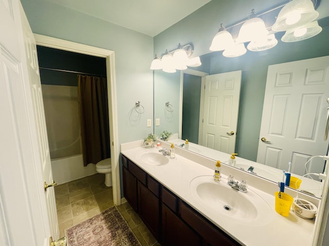 full bathroom with toilet, shower / bath combination with curtain, and vanity