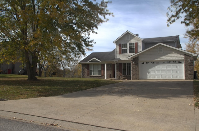 view of front of property with a garage and a front yard