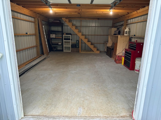 garage featuring baseboard heating