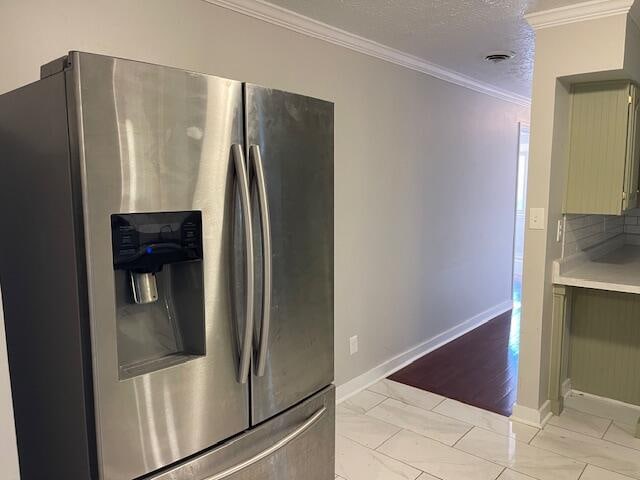 kitchen featuring tasteful backsplash, stainless steel fridge with ice dispenser, a textured ceiling, ornamental molding, and light hardwood / wood-style floors