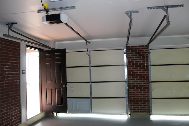 garage featuring a garage door opener