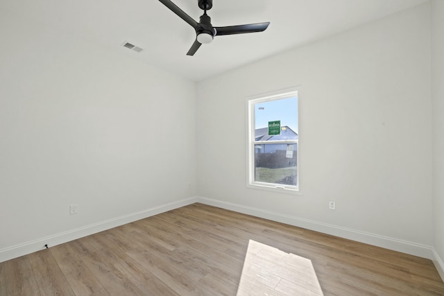 unfurnished room featuring ceiling fan and light hardwood / wood-style floors