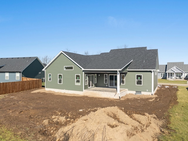 rear view of property featuring a patio