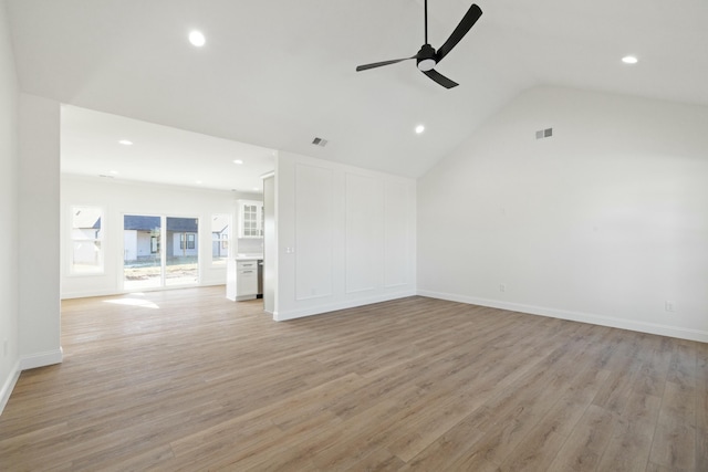 unfurnished living room featuring high vaulted ceiling, ceiling fan, and light wood-type flooring