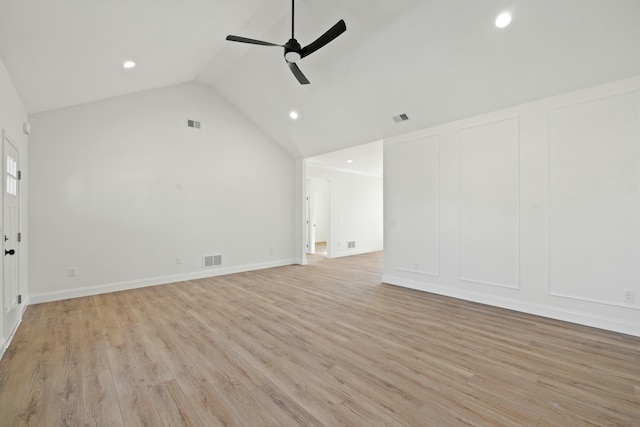 unfurnished living room featuring ceiling fan, high vaulted ceiling, and light hardwood / wood-style flooring