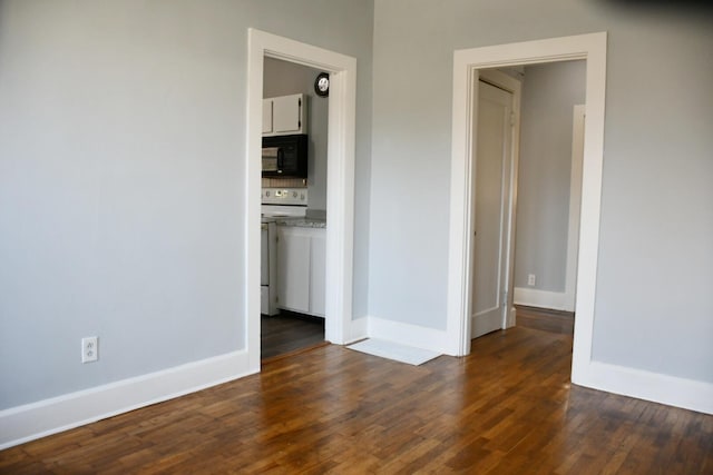 interior space with dark wood-type flooring