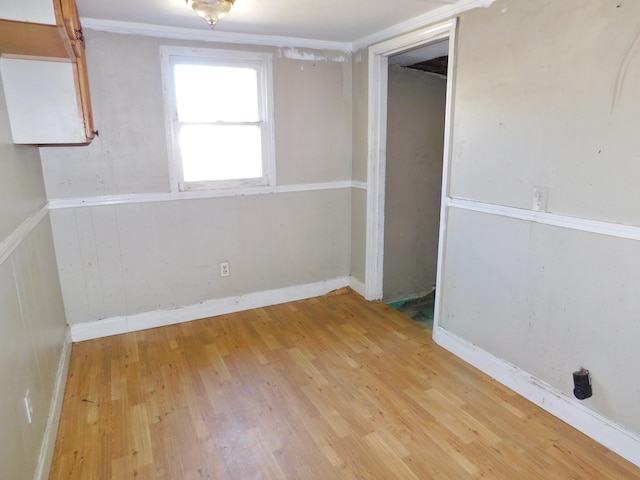 spare room with light hardwood / wood-style floors