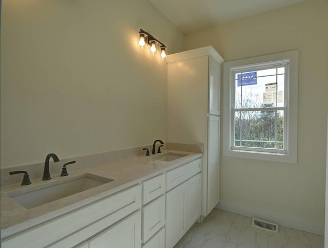 bathroom featuring vanity