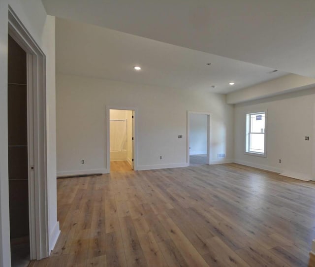 unfurnished room featuring light hardwood / wood-style flooring