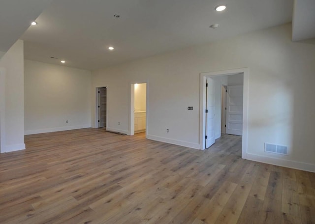 empty room with light wood-type flooring