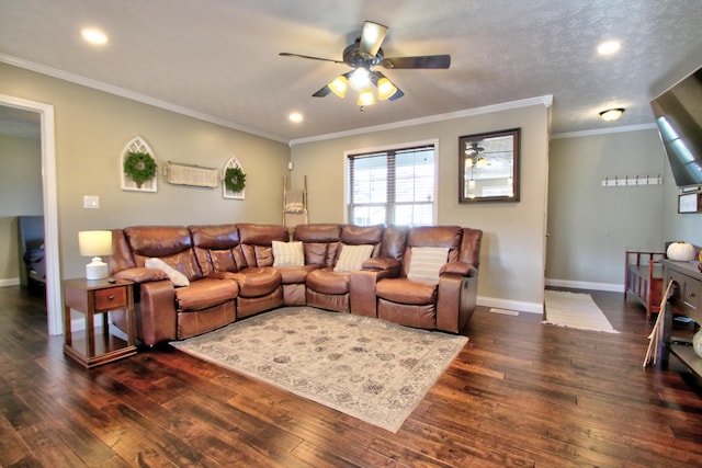 living room with dark wood-type flooring, ceiling fan, ornamental molding, and a textured ceiling