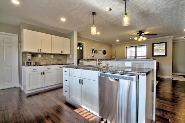 kitchen with white cabinets, dishwasher, dark wood-type flooring, sink, and decorative light fixtures