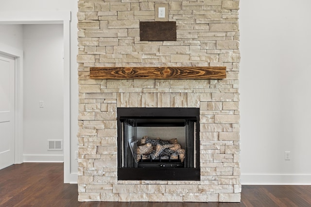 interior details with hardwood / wood-style floors and a fireplace