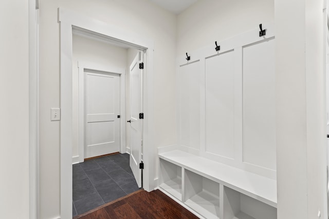 mudroom with dark wood-type flooring