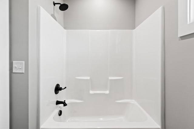 bathroom featuring bathing tub / shower combination