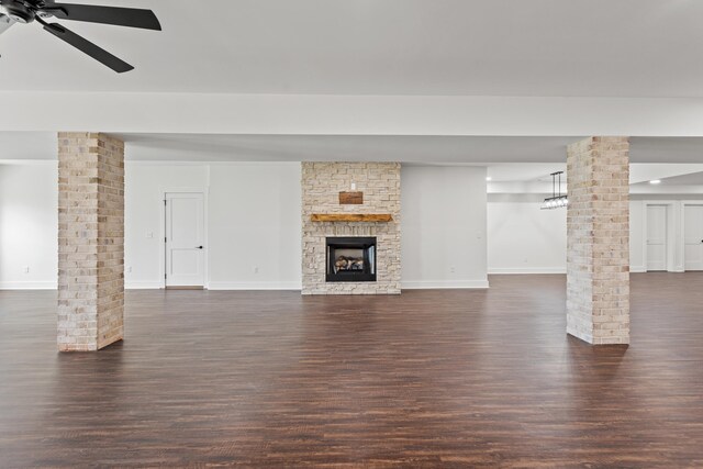 details featuring a stone fireplace and hardwood / wood-style floors