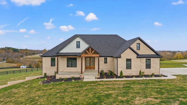 view of front of home with a front lawn and a porch