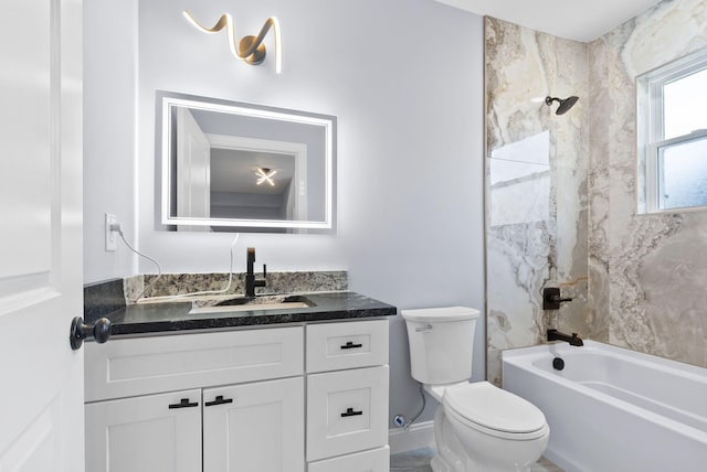 full bathroom featuring vanity, toilet, and tub / shower combination