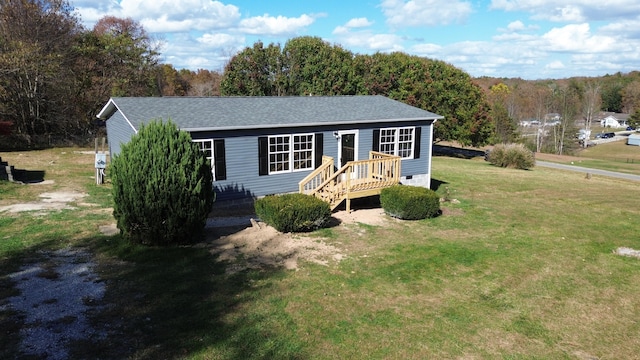 view of front of home featuring a front lawn