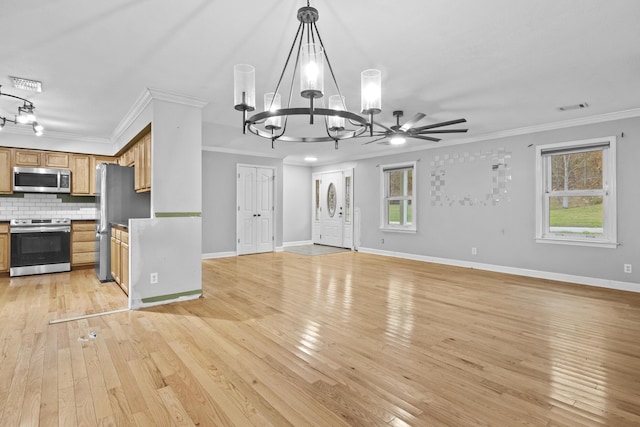 223 Sycamore Rd, Stanton, KY 40380 - unfurnished living room featuring crown molding, a wealth of natural light, baseboards, and light wood-type flooring