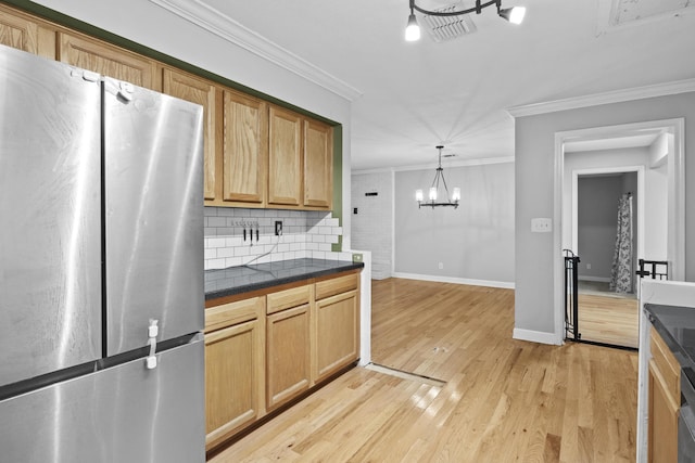 223 Sycamore Rd, Stanton, KY 40380 - kitchen featuring freestanding refrigerator, a notable chandelier, baseboards, tasteful backsplash, and ornamental molding