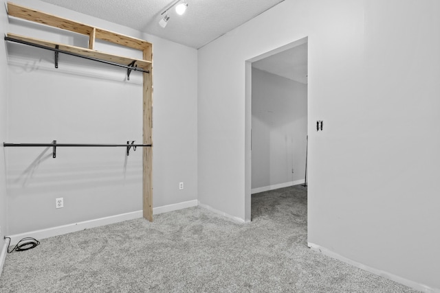 223 Sycamore Rd, Stanton, KY 40380 - interior space with carpet flooring, a textured ceiling, and baseboards