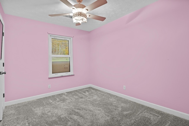 223 Sycamore Rd, Stanton, KY 40380 - unfurnished room featuring baseboards, a textured ceiling, ceiling fan, and carpet floors
