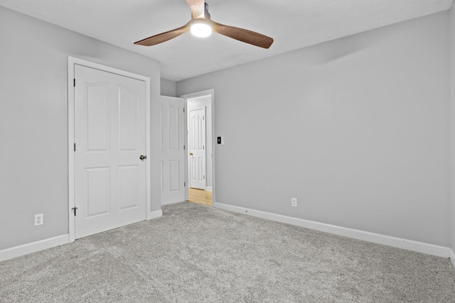 223 Sycamore Rd, Stanton, KY 40380 - unfurnished bedroom featuring baseboards, a ceiling fan, and carpet floors