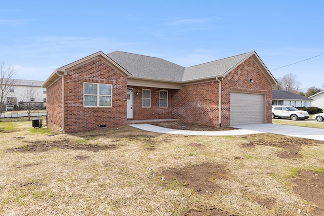 ranch-style house with brick siding, central AC unit, concrete driveway, and a garage