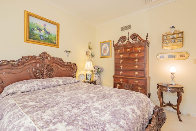 bedroom featuring ornamental molding and carpet floors