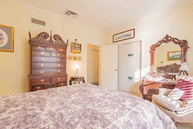 bedroom featuring a closet and crown molding