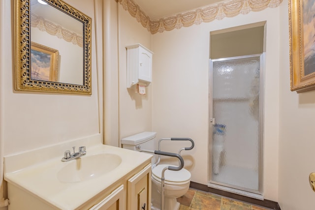 bathroom featuring walk in shower, vanity, and toilet