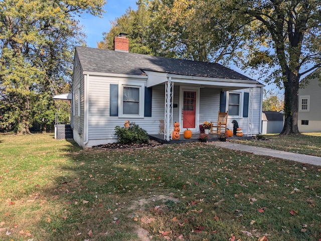 bungalow with a front yard