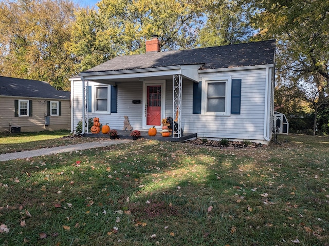 view of front of home featuring a porch and a front yard