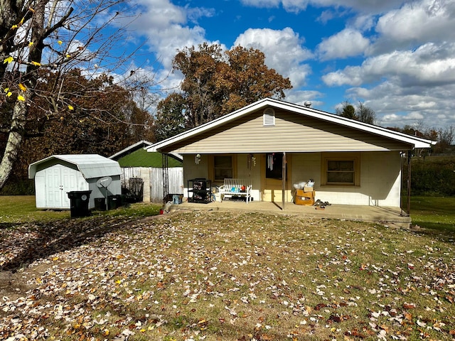 view of front of home with a storage unit