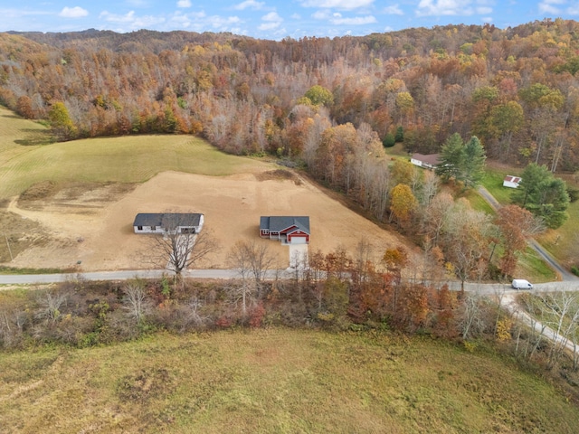 bird's eye view with a forest view