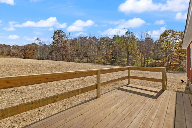 wooden terrace with a forest view