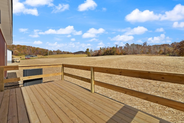 wooden terrace with a forest view