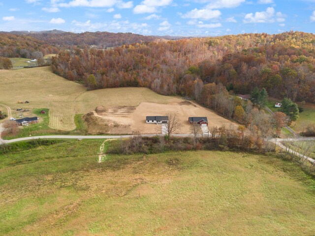 bird's eye view featuring a forest view