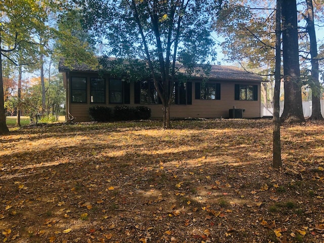 view of front facade featuring cooling unit