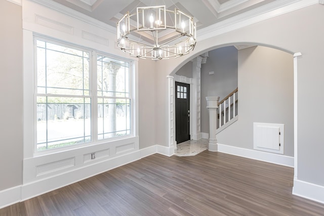 2528 Leland Ln, Lexington, KY 40503 - unfurnished dining area with a chandelier, dark wood finished floors, arched walkways, baseboards, and coffered ceiling