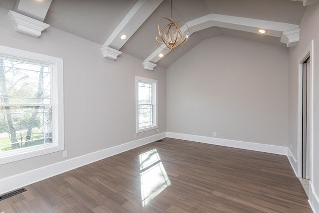 unfurnished dining area featuring dark wood-type flooring, high vaulted ceiling, a wealth of natural light, and an inviting chandelier