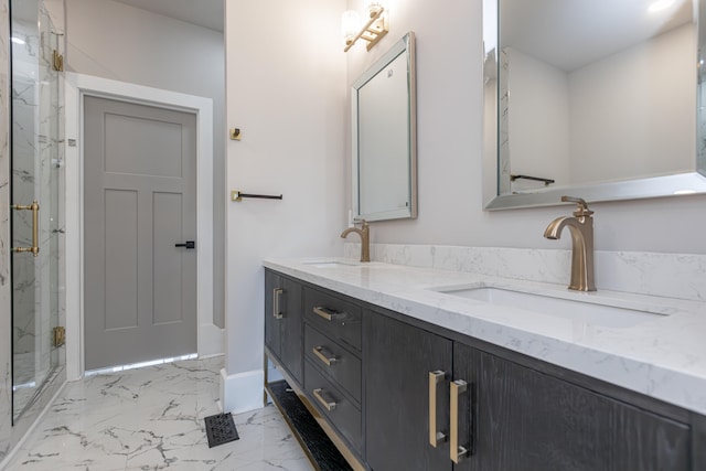 bathroom with vanity and an enclosed shower