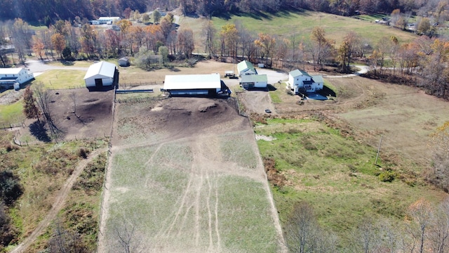 birds eye view of property featuring a rural view