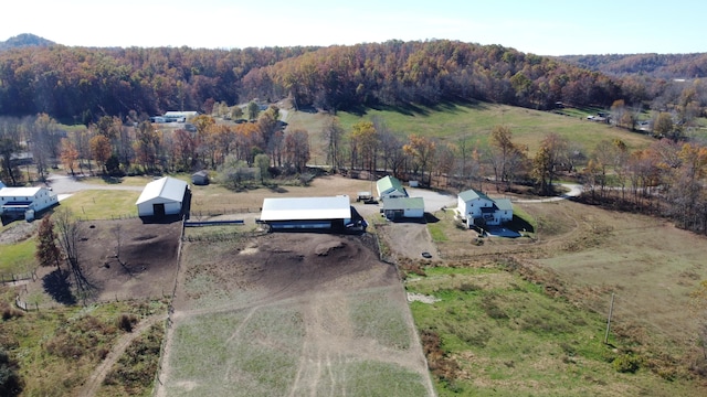 birds eye view of property featuring a rural view