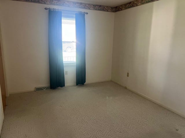 unfurnished room with carpet