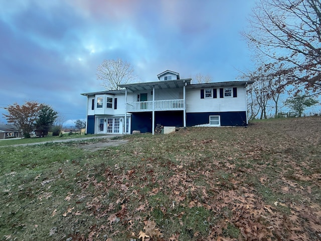 back of house featuring french doors