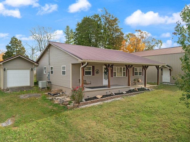 single story home with a front yard, central AC, covered porch, and a garage