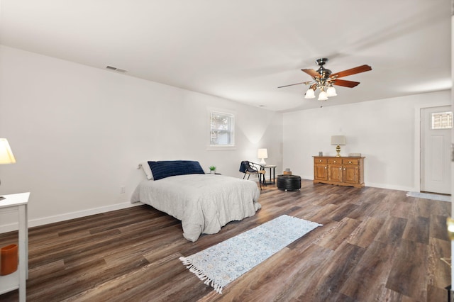 bedroom featuring dark hardwood / wood-style floors and ceiling fan